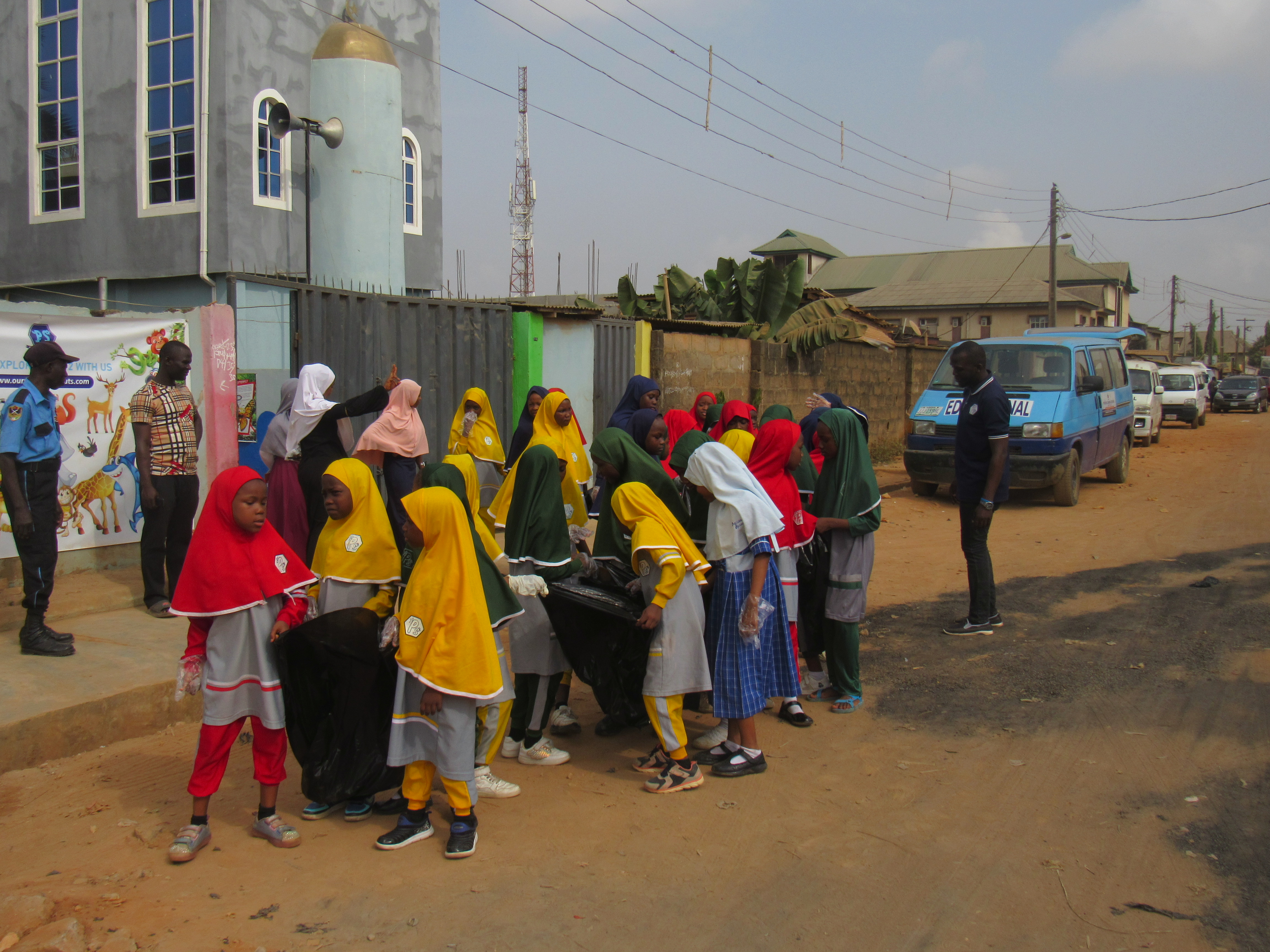 Students engaged in sanitation activities